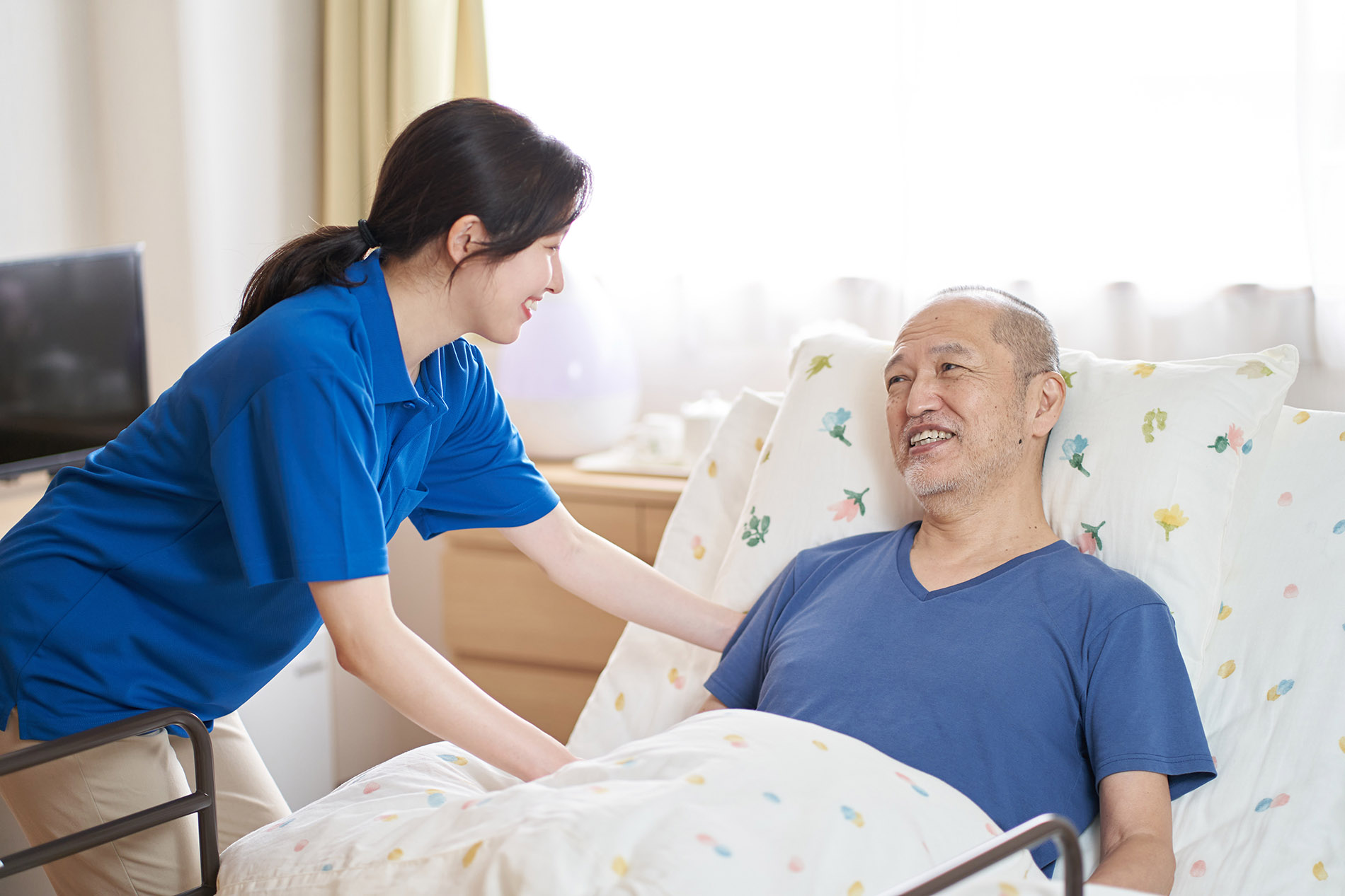 Female caregiver working in a care facility